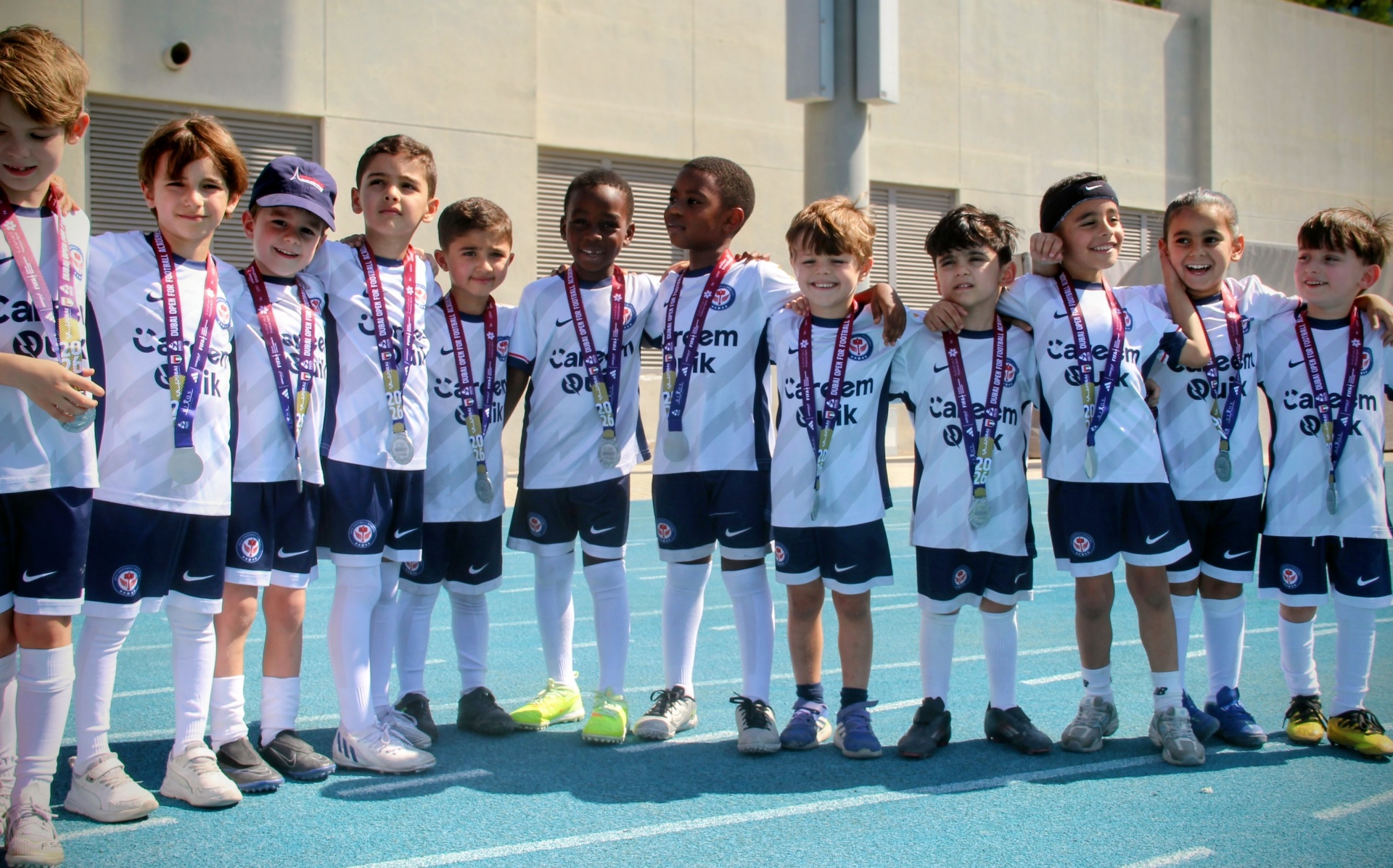EPIC players celebrating together with medals